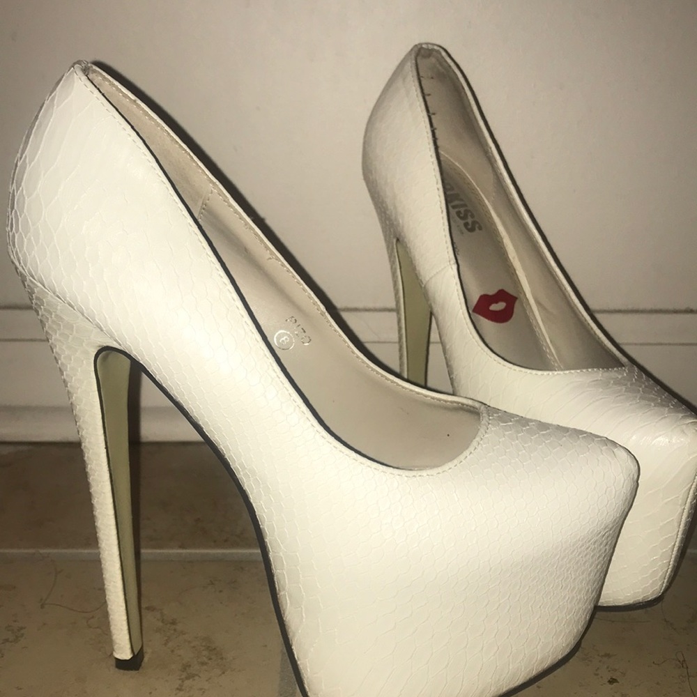 White redkiss heels.